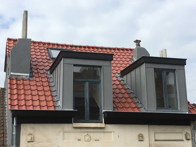 Foto van AMG Batipro | Toiture | rénovation de bâtiment | Tuiles | ardoises | fenêtre et lucarne| corniche | Anderlecht, Bruxelles